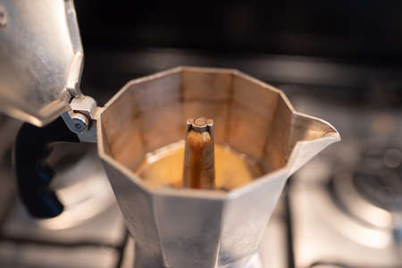 Coffee Moka for Italian espresso. Breakfast drink. Closeup Traditional moka at home. Coffee...