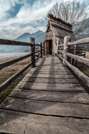Reconstruction of a prehistoric palafitte house from neolithic ageの写真素材
