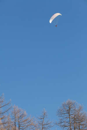 isolated Ski hut with Para gliders.の写真素材