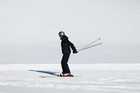 Isolated Skier skiing in mountain.の写真素材