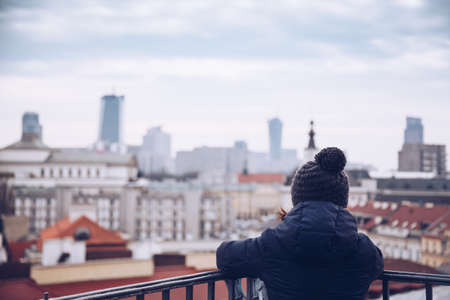Tourist looking the Warsaw City Center from the tower during winter season.の写真素材