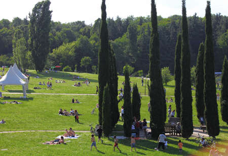 Lombardy MAY 2014 - Italy peoples in the park in a sunny day.のeditorial素材