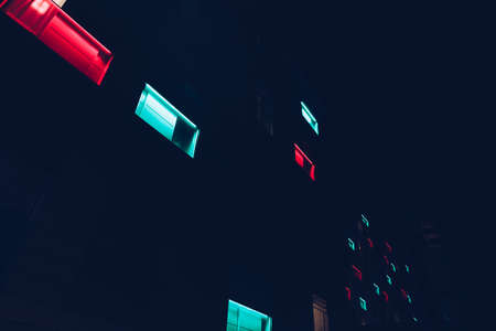 illuminated colored modern windows facade - abstract and futuristic concept.の写真素材