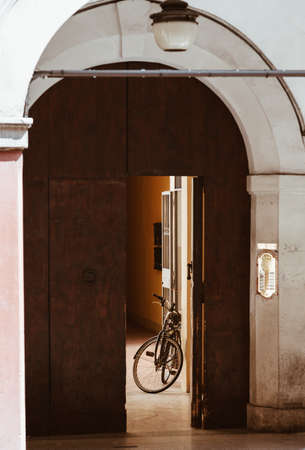old bike in a old house somewhere in italy.の写真素材