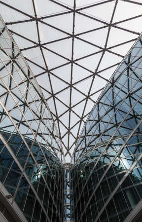 Milan ITALY - July 2018 Abstract structures of a Modern building glass -
