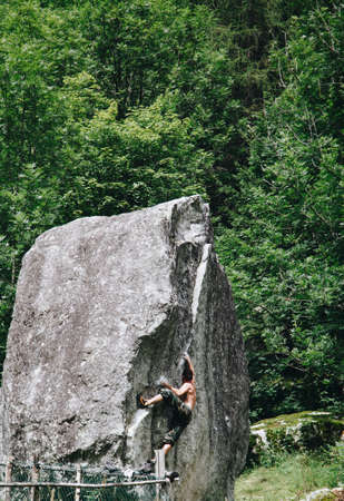 free climbing training session at the rock in Val di Mello - Sondrio - Lombardy - Italyのeditorial素材