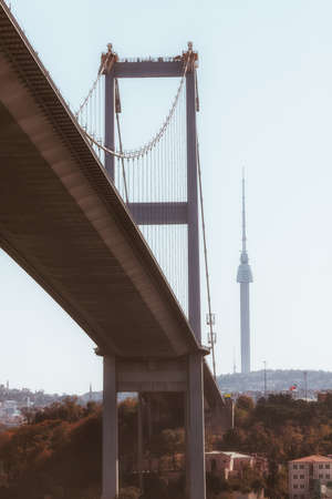 view of the bridge in istanbul from below with a taller tower on the background, turkeyの写真素材
