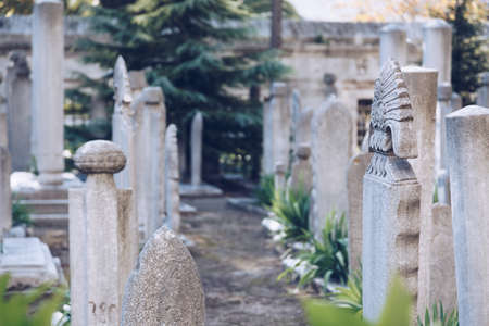 istanbul turkey november 2018 - close up of some headstone, gravestone statue in the Cemetery Of The...