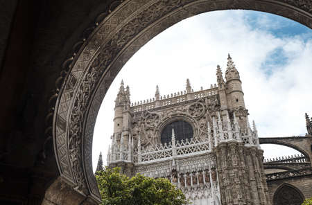 Arabesque arch entrance to the cathedral of La Giralda in Seville, Spain