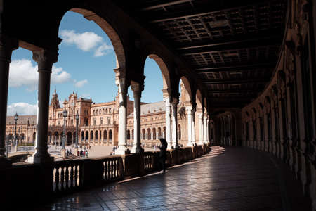 view of Seville's main square Plaza de Espana from arch covered walkway Spain - Andalusiaの写真素材