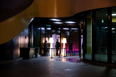 Seville - April 2019 SPAIN entrance hotel under the (metropol parasol) with butler and peoples at...