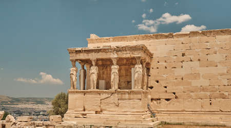 Temple of Athena  - Erechtheum located on the Acropolis area in a sunny day in the capital of Greece...