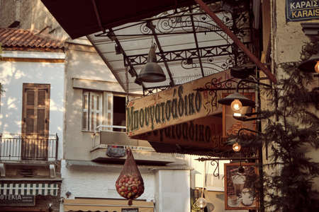 ATHENS, GREECE - JUNE 2019. A view from Monastiraki district in Athens. typical facade and decoration restaurant.のeditorial素材