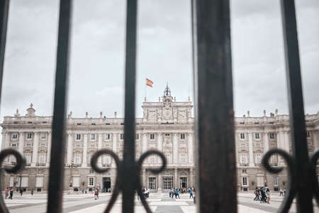 view through the gate of the Royal Palace of Madrid -spain - travel destination - tourist attractionのeditorial素材