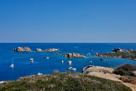 panorama of the lighthouse in the cabbage islands (isola dei cavoli) - with sails boat - Cagliari...