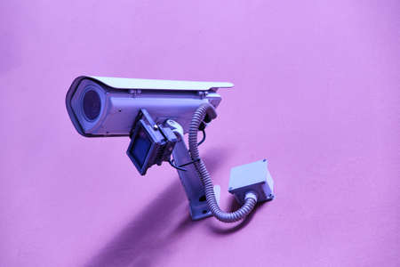 security camera on pink background - Surveillance Camerasの写真素材