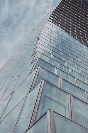 curved modern building - modern abstract glass windows facade buildings - finance business conceptの写真素材