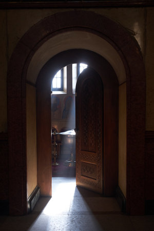 A Stunning View of the Main Cathedral in Tbilisi, Georgia, with Sunlight Piercing Through a Window, Illuminating the Prayer Hall in a Sacred Atmosphere.の写真素材