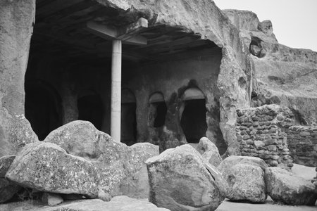entrance, rock, house, uplistsikhe, georgia, stone, cave, ancient, architecture, archaeological, heritage, historic, dwelling, complex, excavation, site, history, structure, nature, sandstone, ruins, tourism, culture, landmark, travel, antique, prehistoric, settlement, carved, outdoors, old, urban, building, arch, unique, cliff, attraction, wallsの写真素材