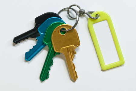 Group of keys of many colors with identification holderの写真素材