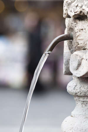A fountain of free drinkable water in Romeの写真素材