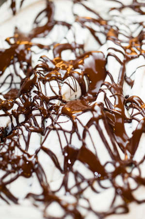 Ice cream preparation with different tools, ingredients, and machinesの写真素材