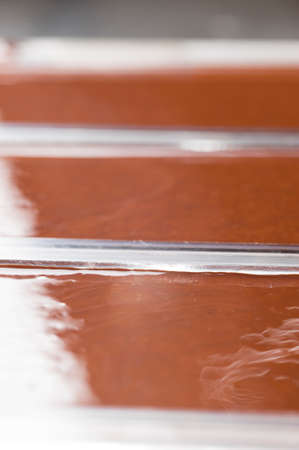 Ingredients for preparation of artisanal chocolate bar with dried fruitsの写真素材