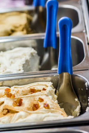 Italian ice cream on display to be scooped and soldの写真素材