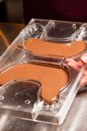 Ingredients and preparation of italian Easter milk and dark choccolate eggs and sweets