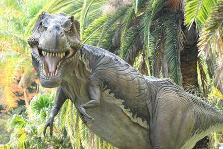 Life-size reconstruction of Tyrannosaurus, a theropod dinosaur of North America, in outdoor exibition.の写真素材