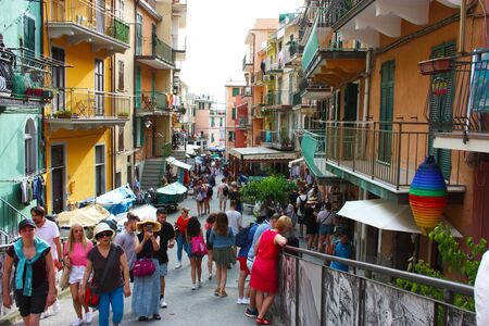 Ligurian town of Monterosso al Mare downhill among the rocks through the typical tourist village...