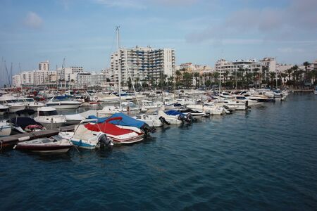 The port of Ibiza in Eivissa where boats and yachts are anchored in the VIP area of...