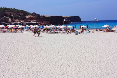 the blue sea and the beautiful beaches of formentera surrounded by arid balearic natureの写真素材