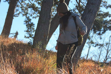 explorer girl on an adventurous excursion in the mountains of the Tuscan-Emilian Apennines. Apuan...
