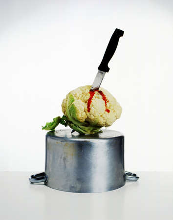 murder of a cauliflower on pot cookingの写真素材