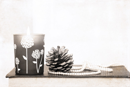 artwork in retro style, burning candle and decorationの写真素材