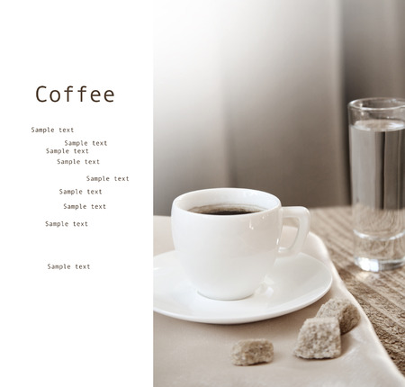 Toned in beige colors image,  cup of dark coffee, white with sample textの写真素材