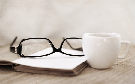 Artwork in retro style, stylish glasses, cup of coffeeの写真素材