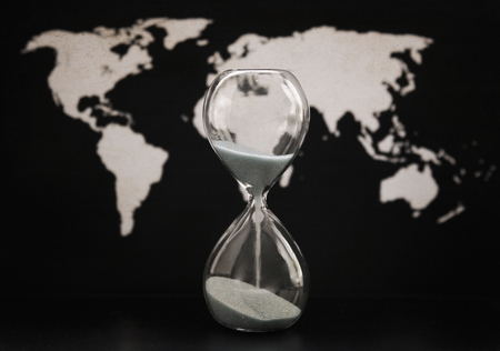 Artwork in retro style,  sandglass, world political map, time passingの写真素材