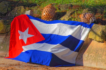 a cuban flag exposed in the groud as a notice of a place to danceの写真素材