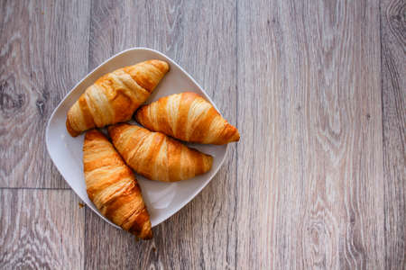 A rich variety of food photography Croissant. Delicious croissants on a wooden tabletop.