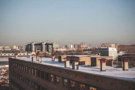 panorama of the city in the rays of the setting sun
The dark blue sky smoothly turning into a pink-yellow house in the rays of the setting sun.の写真素材