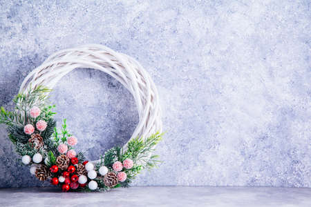 Christmas wreath on gray background. Copy space.の写真素材