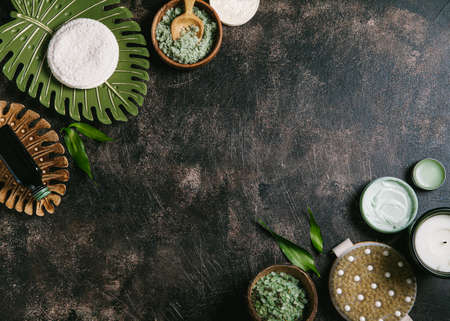 Zero waste concept. Set of natural skin care products and eco friendly bathroom accessories on a brown background. Flat lay, top view, copy space.の写真素材