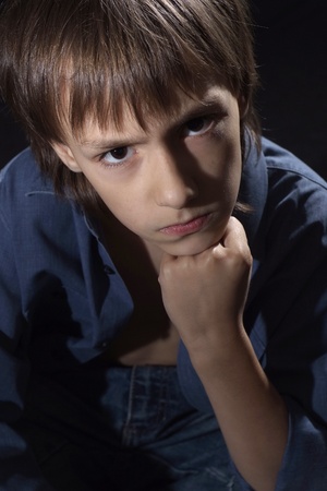 Caucasian male frustrated sitting aroundの写真素材