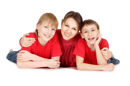 Woman and her sons in a red sweatersの写真素材