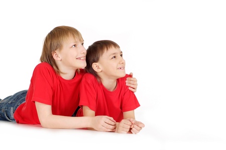Two boys in a red sweatersの写真素材
