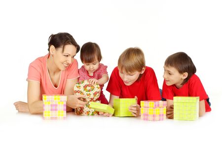 Mother and her children with presentsの写真素材