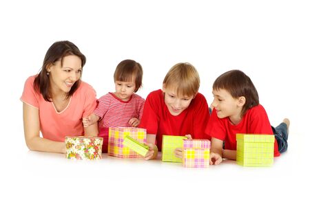 Woman and children with presentsの写真素材