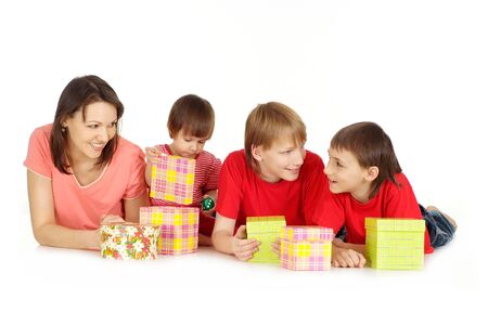 Motehr and children with presentsの写真素材
